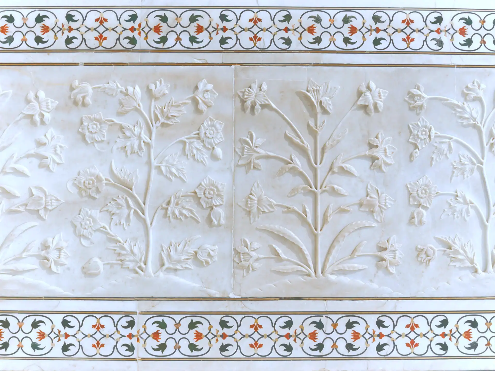 Close-up architectural detail of the white marble inlay work at the Taj Mahal