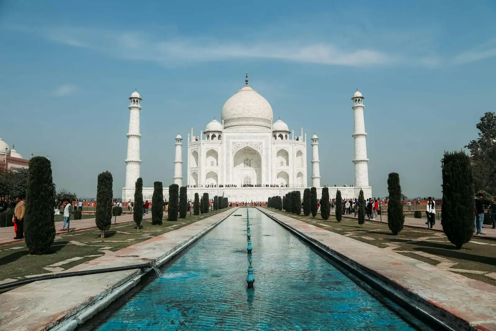 Taj Mahal reflecting pool at sunrise in Agra